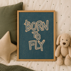 Born to Fly poster styled flat on a child's bed
