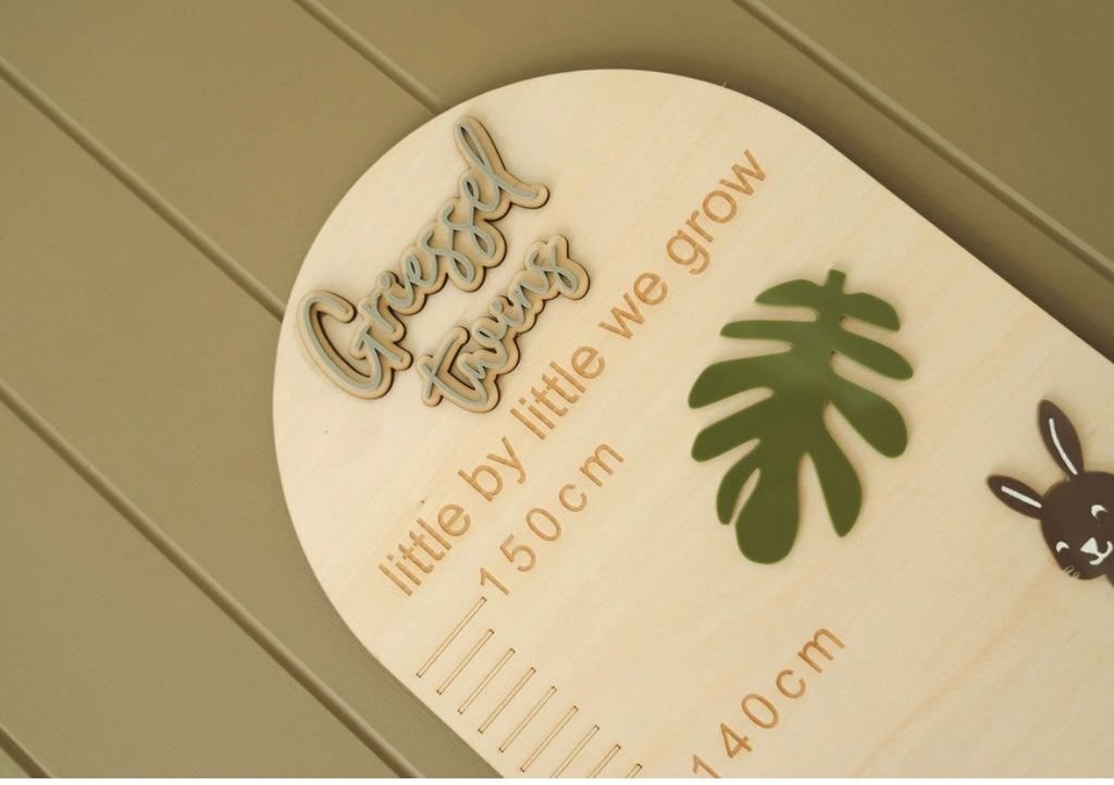 Close-up detail of personalised Forest & Friends wooden height chart