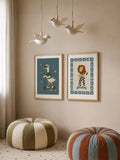 Goose and lion poster set styled together in a kids room